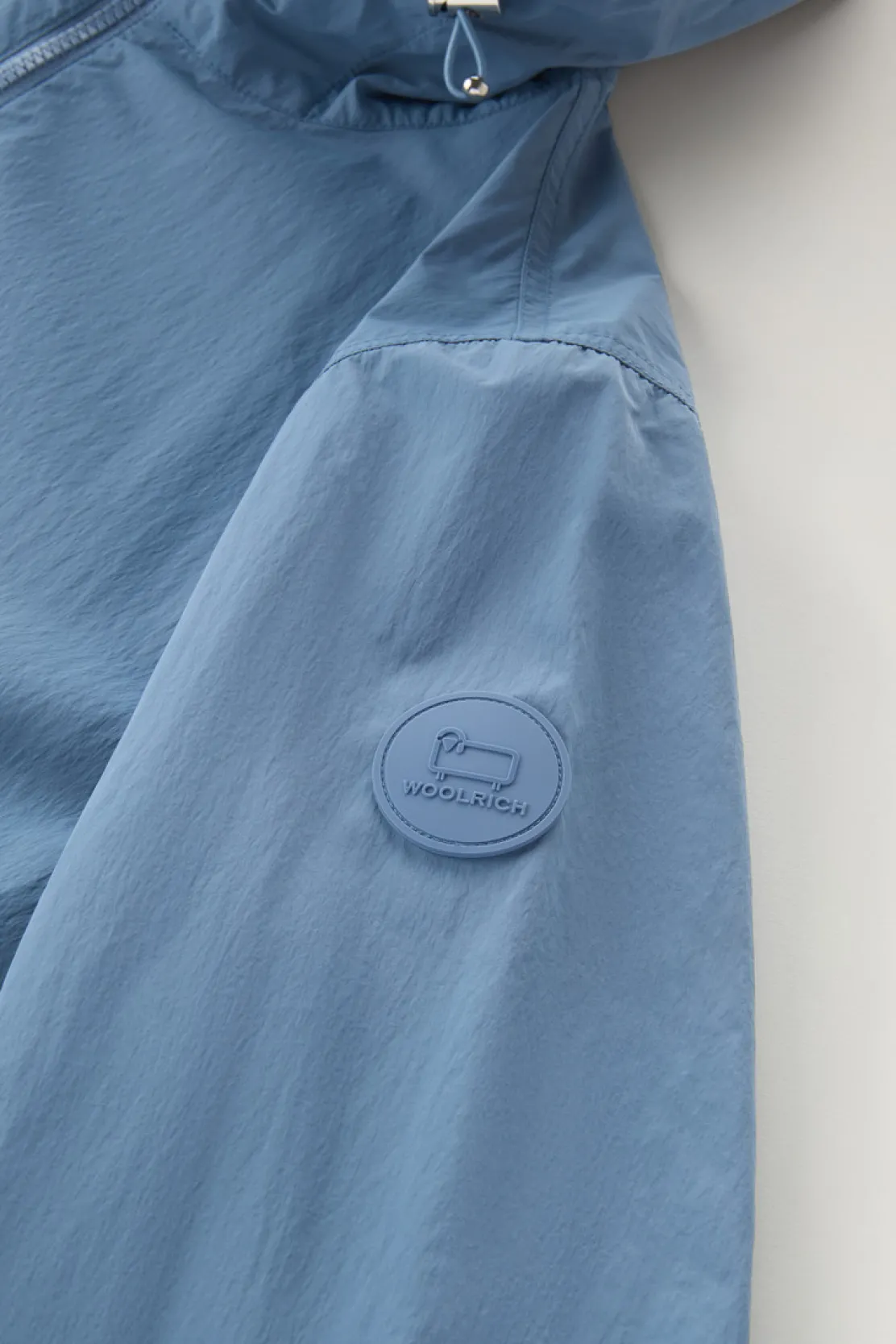Giacche>Woolrich Giacca A Vento In Nylon Crinkle Con Cappuccio Pastel Indigo