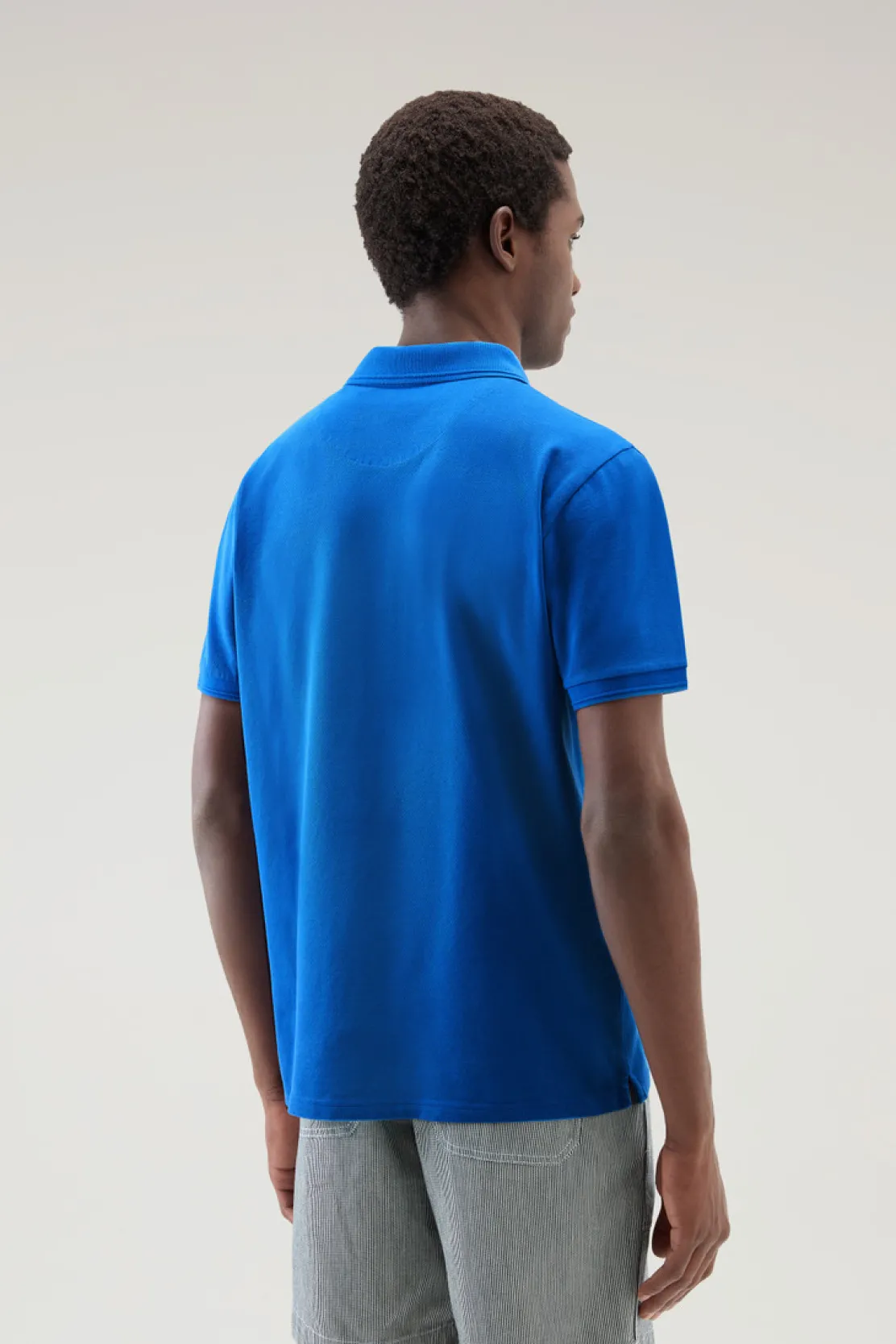 Polo>Woolrich Polo Mackinack Tinta In Capo In Piqué Di Cotone Elasticizzato Snorkel Blue